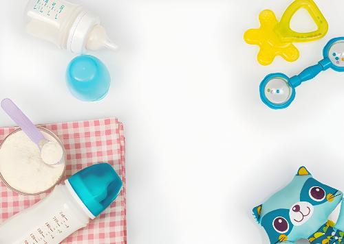 Baby feeding essentials: bottles, formula, bib, and toys for infant nutrition.